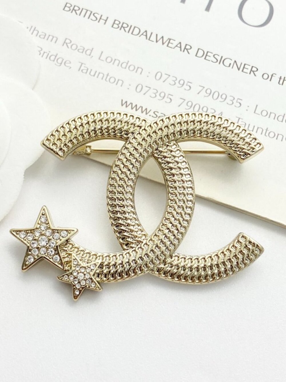 Luxury Chanel Interlocking CC Star Rhinestone Brooch Woven Texture Metal Pin